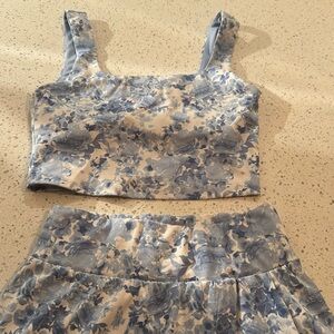 Cropped top with tennis skirt with pocket shorts under skirt